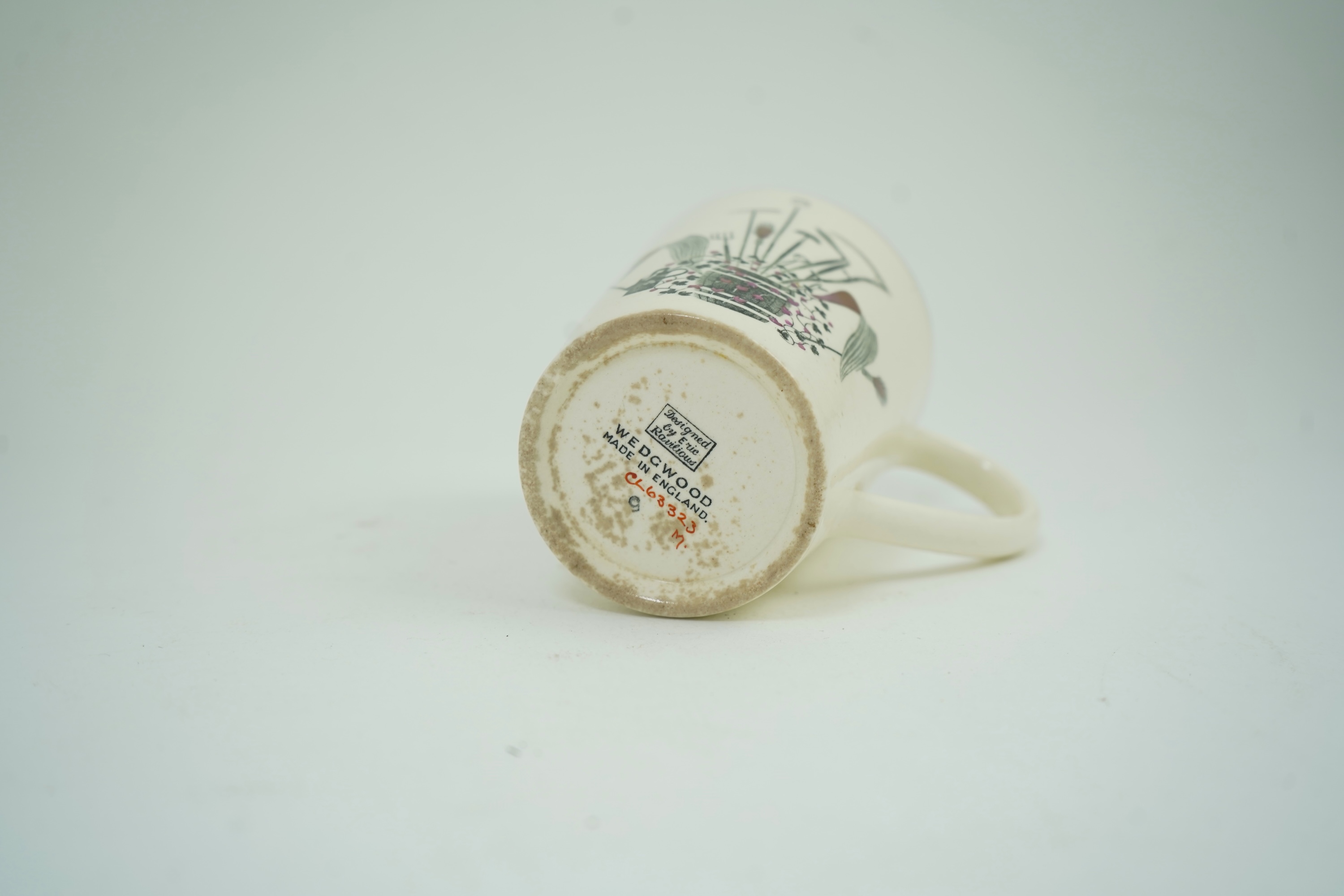 Eric Ravilious (1903-1942) for Wedgwood: A 'Garden Implements' lemonade mug